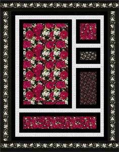 a black and white quilt with red flowers on the front, two squares in the middle