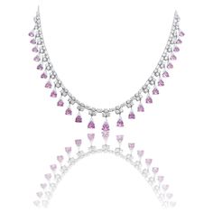 Trillion shape 0.50 carat pink sapphires, in combination with 0.05 carat round diamonds. This choker is made in 18k white gold, and has a self adjustable ball chain mechanism. Luxury Pink Briolette Necklace, Formal Pink Diamond Necklace, Luxury Pink Necklace With Brilliant Cut, Pink Diamond Cut Fine Jewelry Necklace, Luxury Pink Necklaces With Brilliant Cut, Pink Diamond Necklace For Formal Occasions, Fine Pink Sapphire Necklaces For Formal Occasions, Formal Pink Diamond Cut Necklaces, Pink Brilliant Cut Cubic Zirconia Necklaces