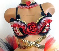 Queen of Hearts inspired Rave Bra - Black bra featuring Gold Sequins torso wrap, Red, White, Black ruffle, Bows, Red pearls, glitter hearts, spikes and center Red rose. Made to order - select your size from the menu above. (if your size is not listed, please request custom size) Matching collar is Queen Of Hearts Rave, Pretty Costumes, Nocturnal Wonderland, Queen Of Hearts Halloween Costume, Coachella Fest, Rave Bras, Bling Bra, Beyond Wonderland, Dream Birthday