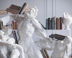 there is a white statue with books on it