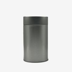 a metal trash can on a white background