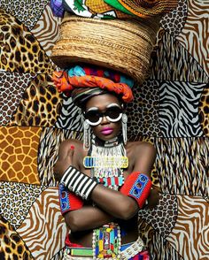 an african woman in colorful clothing and accessories