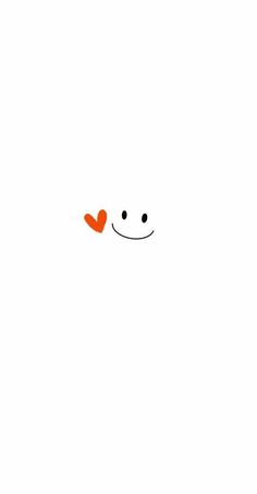 an orange smiley face drawn on a white paper with the word love written in it