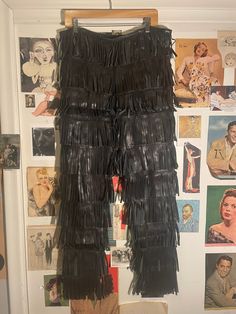 "So fabulous and hard to find! I've never seen pants like this and don't see an exact pair like this for sale any where online! A statement pair of pants to wear for the rest of your life- on the red carpet or for a quick Starbuck drop in.  By the exclusive vintage label Jean Paul Gaultier. Circa 1990's. Size 40. 100% genuine leather. Amazing condition! CONDITION: Expect to find normal signs of vintage wear/age with no significant issues. Some of the leather fringes are \"bent\" from storage and need to \"fall out\". Overall, the item is in good vintage condition. Please view all photos. THANK YOU, KANSAS CITY! We're honored to be nominated by The Pitch magazine in TWO categories this year for \"Best of KC\" 💥 BEST of KC: Vintage Clothing Store 2️⃣0️⃣2️⃣1️⃣ & 2️⃣0️⃣2️⃣2️⃣ 💥 BEST of KC: V Carpet Pants, Vintage Jean Paul Gaultier, Fringe Pants, Vintage Fringe, Vintage Clothing Stores, On The Red Carpet, Vintage Labels, Vintage Magazine, Leather Fringe