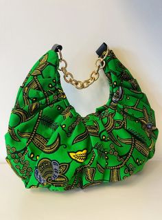 ANKARA CANVAS SHOULDER BAG - Lili Creation | Buy Now on Sellox Green Canvas Bag With Leather Handles For On-the-go, Trendy Green Canvas Bag With Removable Pouch, Green Canvas Pouch Shoulder Bag, Green Shoulder Canvas Bag With Removable Pouch, Green Canvas Shoulder Bag For On-the-go, Green Canvas Shoulder Bag With Removable Pouch, Green Canvas Bags With Adjustable Strap, Green Trendy Hobo Bag With Detachable Strap, Trendy Green Hobo Bag With Detachable Strap