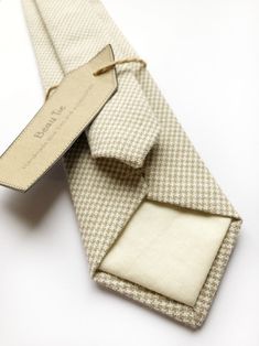 Men’s tie handmade using vintage linen with an ivory and taupe houndstooth print #menstie #menslinentie #linentie #houndstooth #houndstoothprint #houndstoothtie #vintagetie #taupe #ivorylinen #weddingtie #menswear #menshoundstoothtie Wedding Capsule, 3 Man, True Autumn, Smart Men, Wool Tie, Tie Men's, Tie Gifts