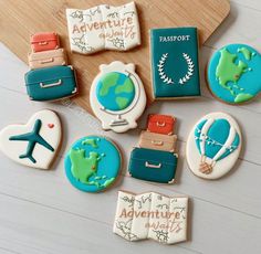 some cookies are decorated with travel related items