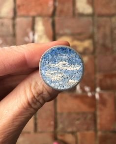 This unique silver ring has a 3/4 inch diameter micromosaic of a peace blue sky with wispy, white clouds. The mosaic was made using the technique and materials of traditional Italian micromosaic. The ring is size 6.5 Oval Mosaic Ring, Mosaic Rings, Micro Mosaic Ring, Mosaic Necklace, Mosaic Ring, Wispy Clouds, Unique Silver Rings, Micro Mosaic Jewelry, Blue Murano Glass Round Jewelry