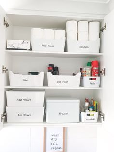 organized pantry shelves with white bins and labeled labels