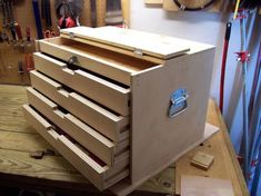 the drawers are being assembled and ready to be put into the workbench for repair