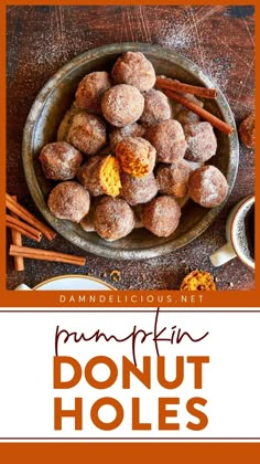 pumpkin donut holes in a bowl with cinnamon sticks on the side and an orange background