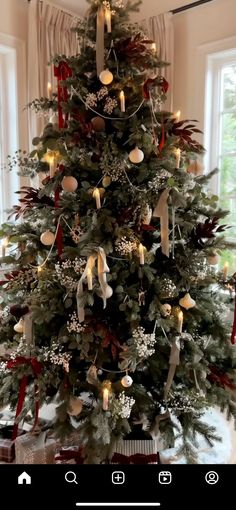 a decorated christmas tree in a living room