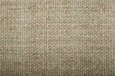 an upholstered fabric textured with brown and white colors