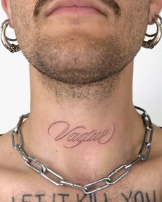 a man with a chain around his neck has a tattoo on his chest that says, let it kill you