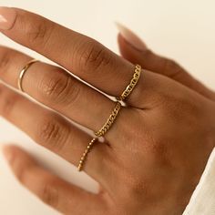 Masculine with a feminine touch! Our 14K Gold quality Mariner Link chain shimmers from every angle. Better than a typical ring, it won't fall off in cold temperatures! 14K Gold Mariner Link Curb Chain Hypoallergenic, lead and nickel free Width 2.6mm Made in NYC #RS024-G Gold Chain Link Ring, Knots Jewelry, Chain Ring Gold, Moms Bracelet, Studded Necklace, Gold Statement Ring, Month Gifts, Linking Rings, Waterproof Jewelry