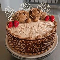 a cake with chocolate frosting and strawberries on top