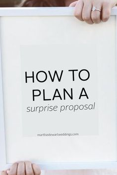 a person holding up a sign that says how to plan a surprise proposal