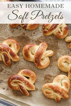 homemade soft pretzels on a baking sheet with the words easy homemade soft pretzels