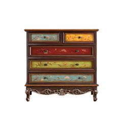 an ornate dresser with multicolored drawers