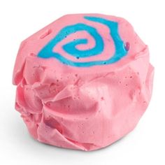 a pink and blue bath bomb on a white background