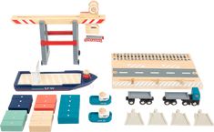 a wooden toy train set with tracks and accessories