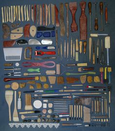 an assortment of different tools are laid out on a table