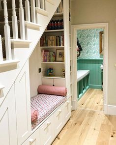 there is a book shelf in the hallway