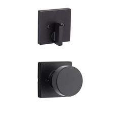 an image of a black door handle and knob