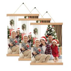 a family is hanging on the wall with their christmas hats and ornaments in front of them