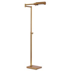 a brass colored floor lamp with a wooden base and a white light on the side