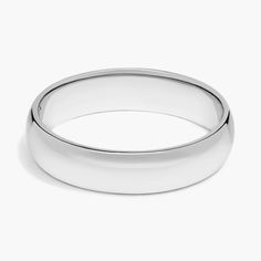 a white wedding ring on a white background