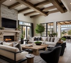 a living room filled with furniture and a flat screen tv mounted on the wall above a fireplace