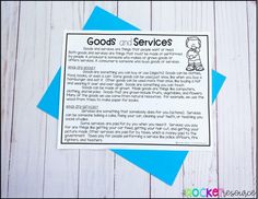 a good and services poster on top of some blue paper with the words goods and services