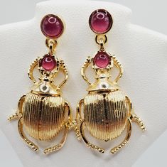 Beautiful Gold Beetle Bug Earrings! These Have A Pinkish Color Stones In Them. These Are A Stud Style And They Dangle And Move. New High Quality Made! Box A-1 Listing Vintage And New Jewelry Daily, Bundle And Save, Offers Welcome, Shipping Discount Applied! Tags: Other Items I Sell Are, Lululemon, Coach, Michael Kors, Nike, Swavorski, Givenchy, Gym Shark, Matilda Jane, Halloween Costumes, Pin Up Clothing, Retro, Mod, Vintage, Jewelry, Diamond Gold Ring, Necklace, Bracelet. 925 Sterling Silver, Handmade, Loft, Gap, White House Black Market Whbm, Free People, Navajo Trading Post, Leather, Wedding, Pets Supplies, Shipping Supplies, Poly Mailers, Thank You Stickers, Cards, Tags, Guess Gold Beetle, Pin Up Clothing, Beetle Earrings, Bug Earrings, Pets Supplies, Xoxo Jewelry, Sugar Skull Earrings, Minnie Mouse Earrings, Crystal Pearl Earrings