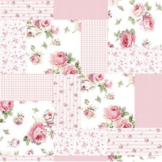 a pink and white patchwork quilt with roses on it