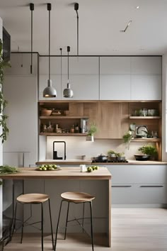 two stools are in front of the kitchen island