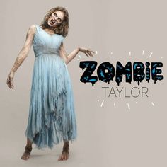 a woman in a blue dress with the words zombie taylor on her face and hands