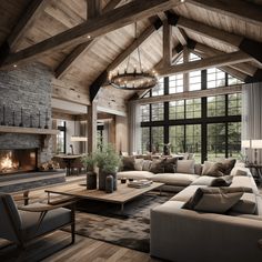 a living room filled with lots of furniture and a fire place in the middle of it