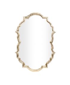 a mirror that is sitting on top of a white wall and has an oval frame