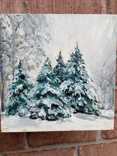 a painting of snow covered trees on a brick wall