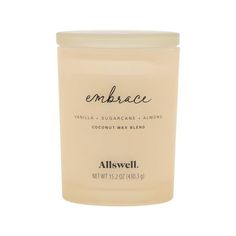 an embrace candle with the words, allswell on it's front and bottom