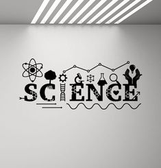 a wall with the word science written in black and white on it's side