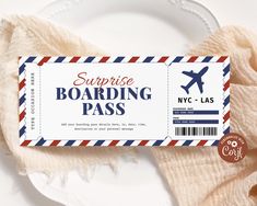 a boarding pass sitting on top of a white plate