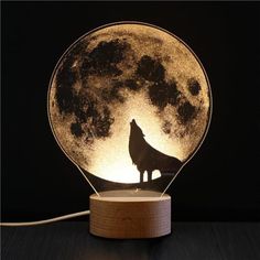 a wolf lamp sitting on top of a table