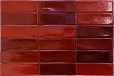 a close up shot of some red tiles