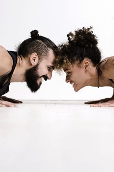 two people are posing for the camera with their heads together