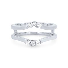 two white gold rings with three diamonds on each side and one diamond in the middle