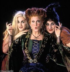 three women dressed up as witches posing for a photo together with the caption wednesday party