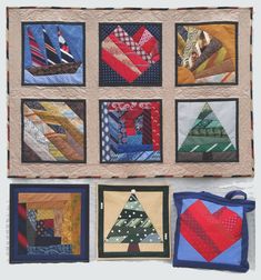 a quilted wall hanging with many different designs on it