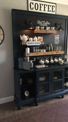 a coffee shop with lots of items on the counter and clock in the wall behind it